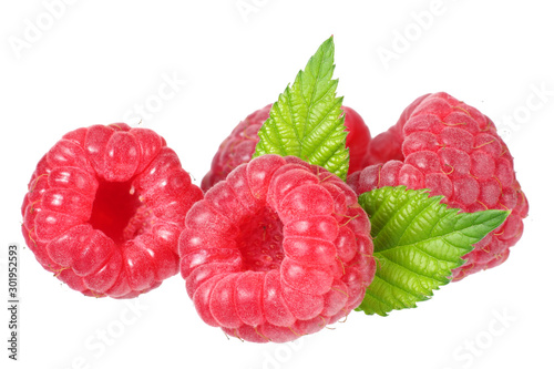 ripe raspberries with green leaf isolated on white background