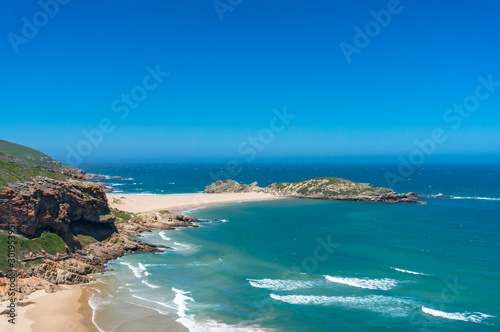 Summer beach nature background with ocean, sand shore. Beach holiday landscape