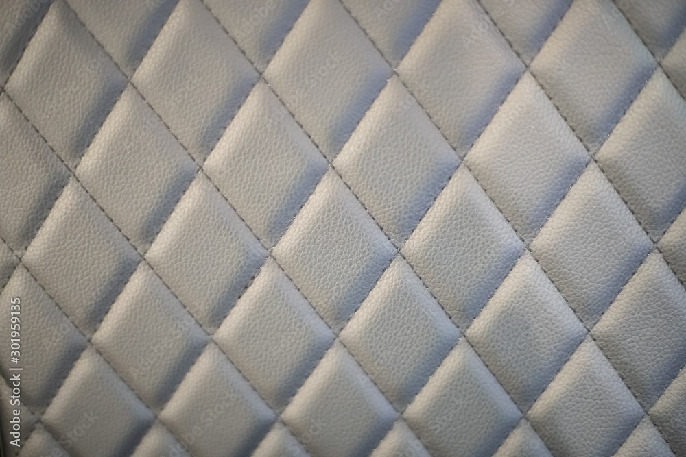 Fototapeta premium Gray sofa leather textures, surface background close up