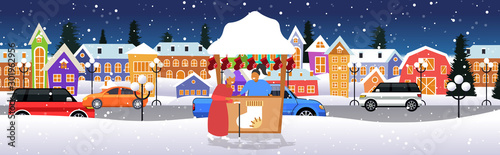 senior woman near stall with female seller christmas market winter fair concept happy new year merry xmas holidays celebration modern city street cityscape background full length horizontal vector