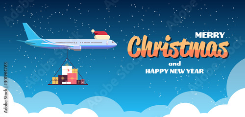 airplane with red santa hat flying with colorful gift present boxes merry christmas happy new year winter holidays celebration concept greeting card horizontal copy space vector illustration