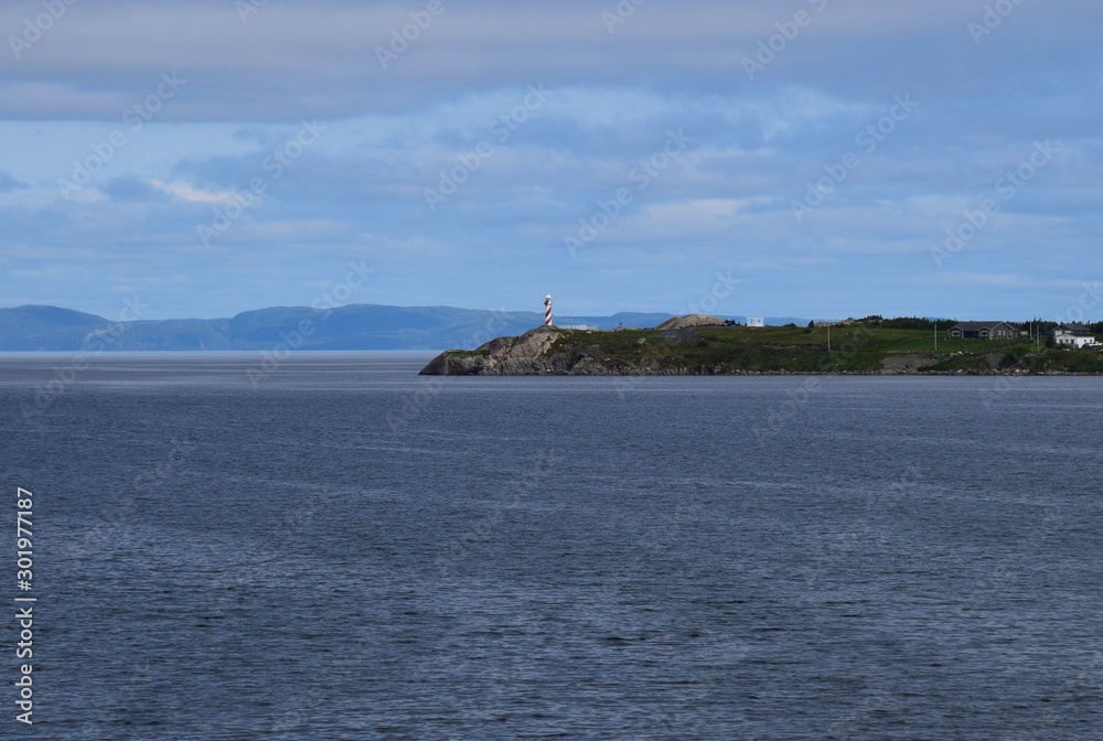 Baccalieu Trail landscape, view across the bay towards the lighthouse, Heart's Content Newfoundland Canada