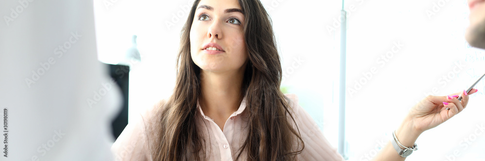 Φωτογραφία Portrait of pretty businesswoman talking with businesspeople and discussing important business strategy or agreement