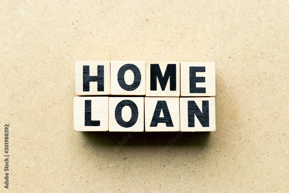 Obraz premium Letter block in word home loan on wood background