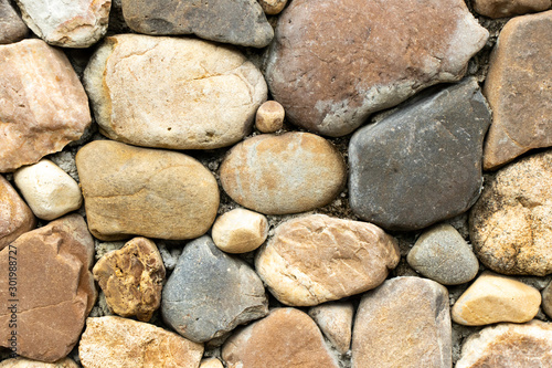 Many size of rock composite to stone wall background