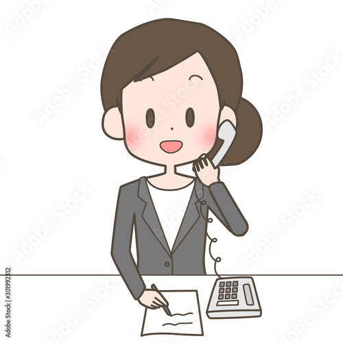 電話対応をする女性　スーツ