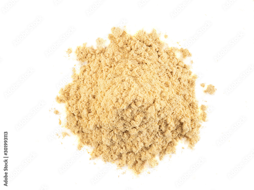 Small pile of ground mustard isolated on white background with copy space for text, images. Spices and herbs. Packaging concept. Close-up, top view. Small pile of ground mustard isolated on white background with copy space for text, images. Spices and herbs. Packaging concept. Close-up, top view.