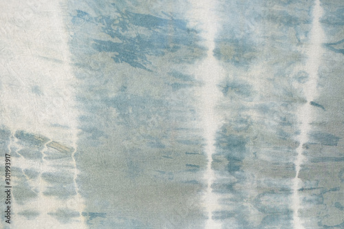 Fotografie tie dye pattern dip dyed technique on cotton fabric background
