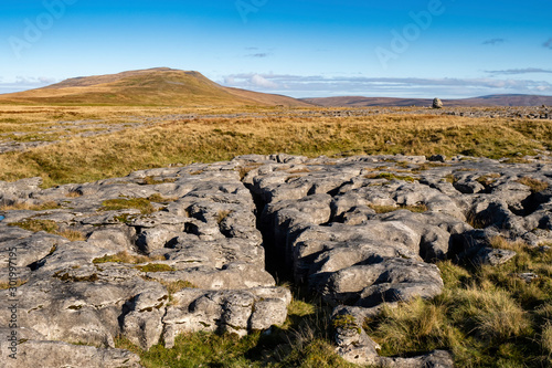 Whernside is a mountain in the Yorkshire Dales in Northern England. It is the highest of the Yorkshire Three Peaks, the other two being Ingleborough and Pen-y-ghent.
