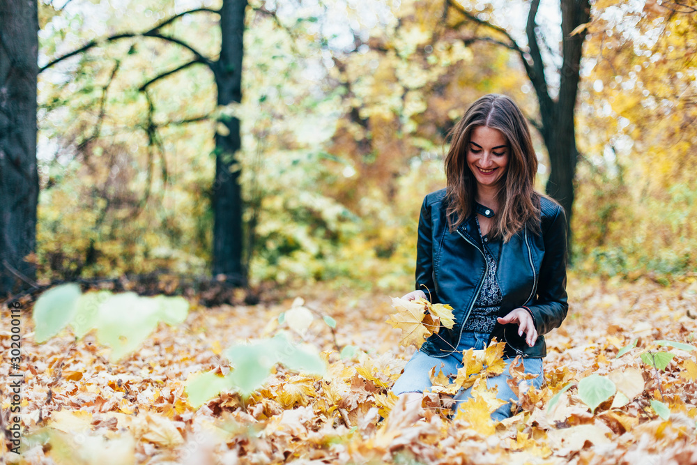 Girl walks in the autumn park Girl walks in the autumn park
