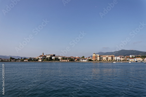 Fuentarrabia, Basque Country, Spain - View to the village from the french side of the Bidassoa river photo