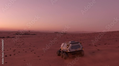 Mars rover with colonists travelling across the surface of Mars at dusk