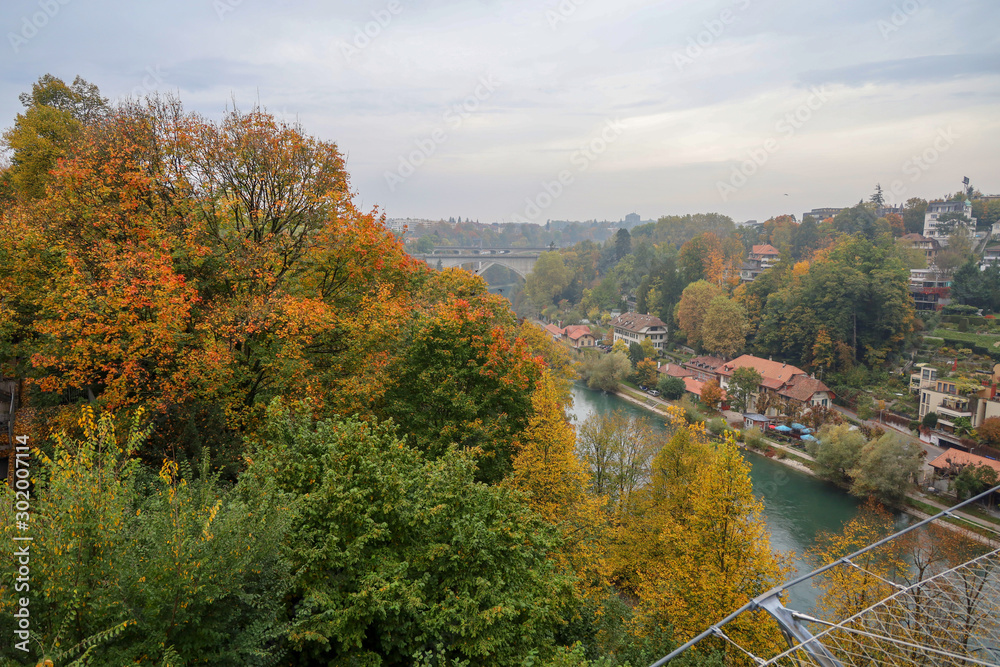 Bern, Switzerland-October 23,2019:View of the river and bridge in autumn season is the beautiful nature from bern
