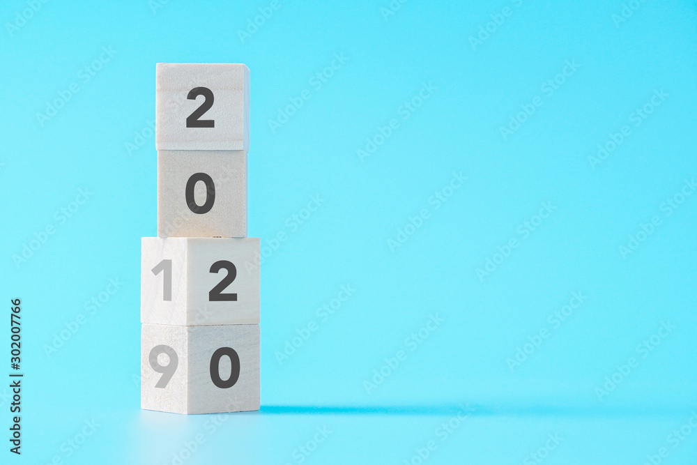 wood cubes changing from New year 2019 to 2020 concept on isolated background with copy space wood cubes changing from New year 2019 to 2020 concept on isolated background with copy space