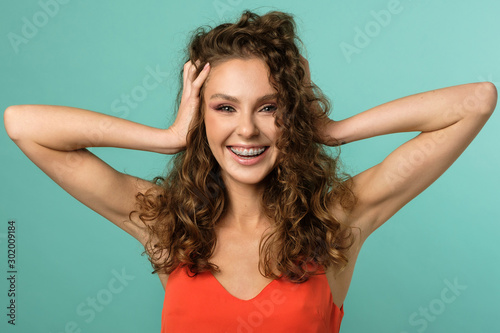Pretty girl isolated on blue background