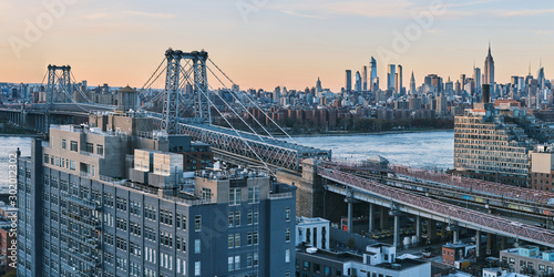 Williamsburg bridge and Midtown Manhattan skyline. photo
