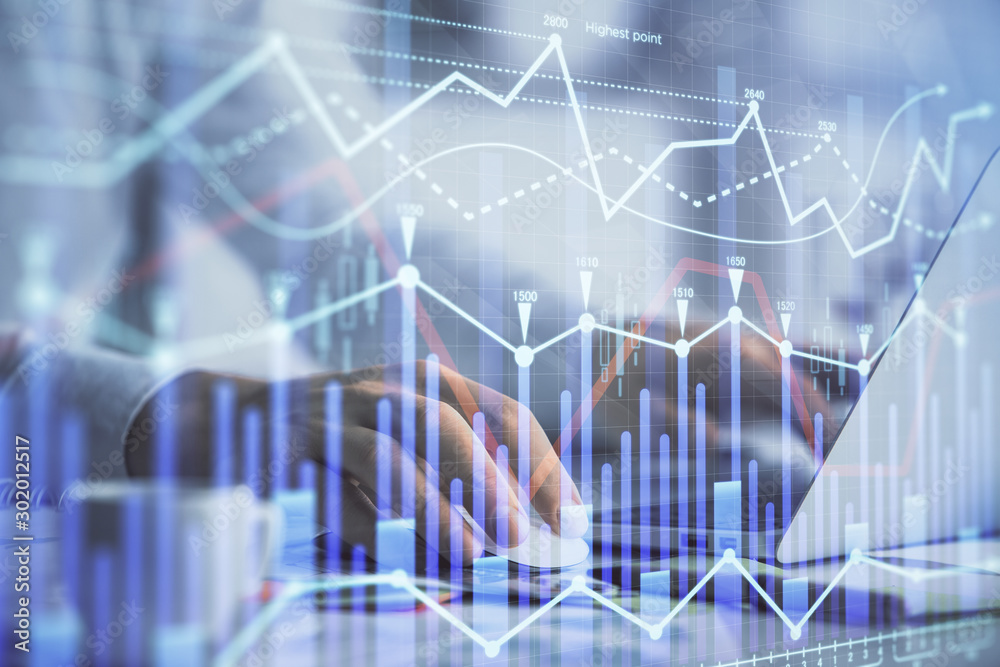 Double exposure of forex graph with man working on computer on background. Concept of market analysis. Double exposure of forex graph with man working on computer on background. Concept of market analysis.