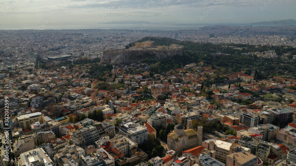 Aerial photo of urban Athens cityscape and Acropolis hill as seen from Lycabettus hill, Attica, Greece