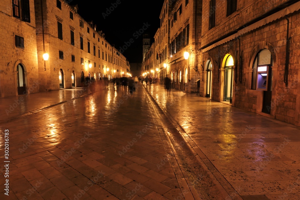 Stradun in Dubrovnik at night with atmospheric lighting