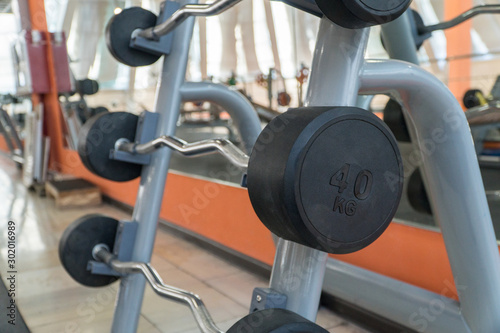 sports equipment and barbells in the gym