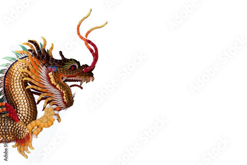 Chinese golden dragon statue for decoration in the temple isolated on white background. © KE.Take a photo