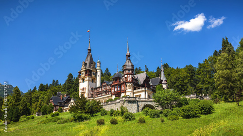 Peles Castle, Romania. Beautiful famous royal castle and ornamental garden in Sinaia landmark of Carpathian Mountains in Europe