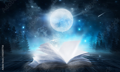 An open book on a wooden ta...