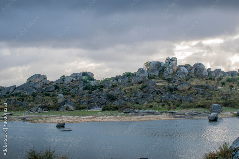 Fototapeta premium Large size granite boulder and bog
