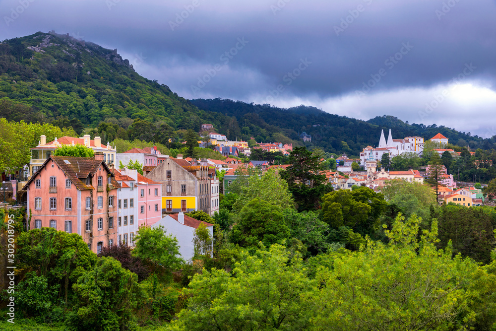 Portuguese city of Sintra, a UNESCO World Heritage Site. Sintra city near Lisbon with Sintra National Palace in the background. Sintra, Portugal.