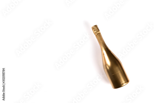 Bottle of Golden Champagne.Symbol of Christmas and New Year.
