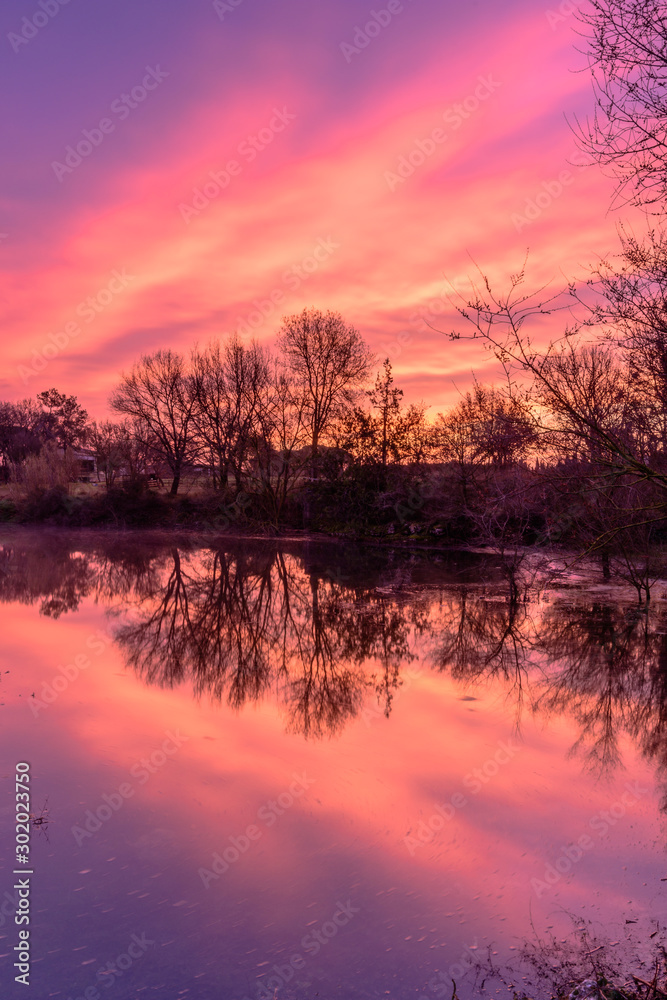 Fototapeta premium Dawn at Estany de Espolla (a temporally formed lake, Catalonia, Spain)