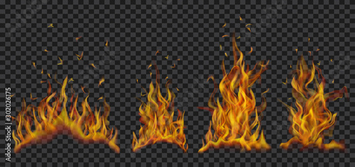 Set of translucent burning campfires of flames and sparks on transparent background. For used on dark backgrounds. Transparency only in vector format