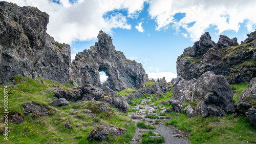 Volcanic lava rocks at Djupalonssandur beach in Snaefellsnes peninsula in Western Iceland photo