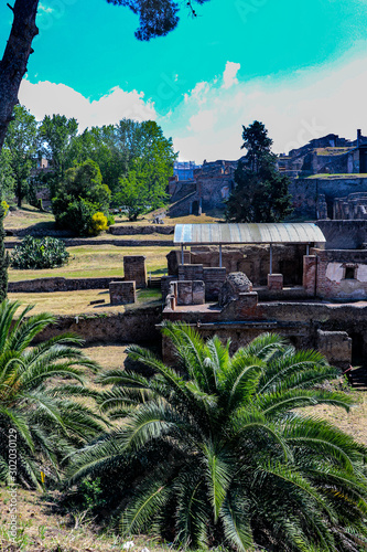 Exploring the houses and streets of the ancient city of Pompeii which is an ancient Roman city near Naples Italy that was  destroyed by  the eruption of Mount Vesuvius photo