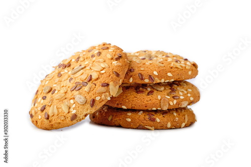 Cookies with nuts and seeds isolated on white background