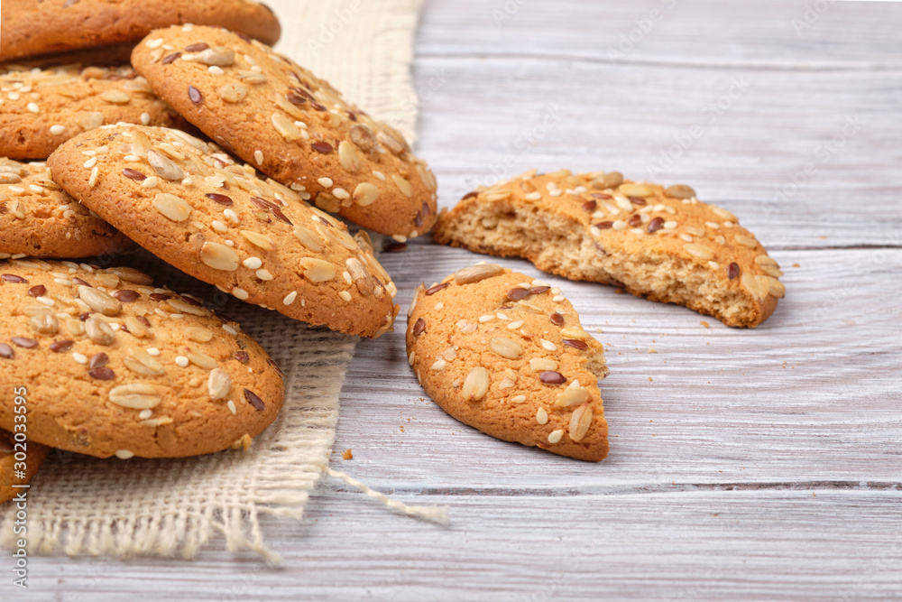Cookies with nuts and seeds ion a wooden table Cookies with nuts and seeds ion a wooden table