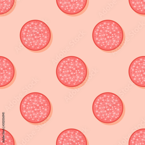 Seamless pattern with slices of salami sausage on orange background. Vector texture.
