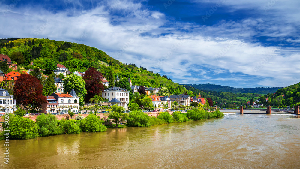 Panoramic view of beautiful medieval town Heidelberg including Carl Theodor Old Bridge, Neckar river, Church of the Holy Spirit, Germany