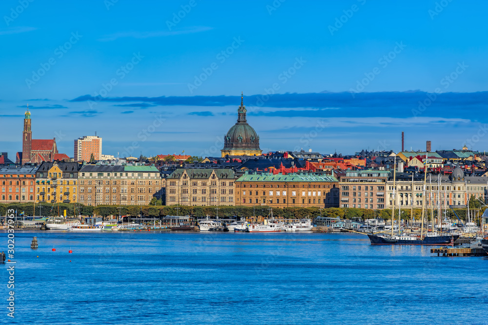 Panoramic view of the boulevard Strandvägen in Östermalm from Saltsjön bay with various touristic sightseeing boats, yachts, ferry  and ships in Stockholm, Sweden.