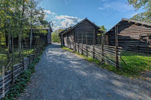 Example of well-preserved traditional pre industrial wooden farmstead at Skansen open-air museum. Stockholm  Sweden.
