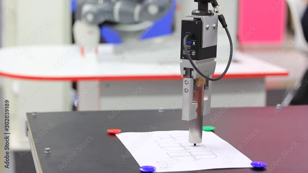 Automatic line drawing with a special machine with a metal tip and a ...