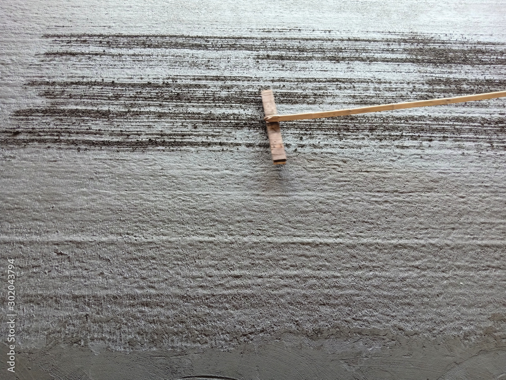 Scraping the surface of the concrete road To create friction between