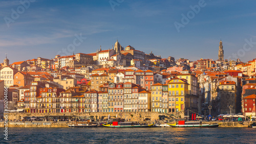 Wallpaper Mural Colorful houses of Porto Ribeira, traditional facades, old multi-colored houses with red roof tiles on the embankment in the city of Porto, Portugal Torontodigital.ca