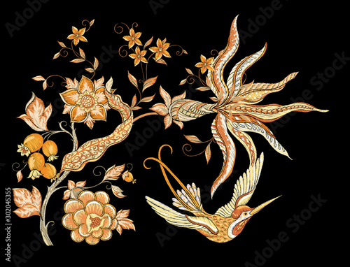 Elements for design. Fantasy flowers, traditional Jacobean embroidery style. Embroidery imitation. Vector illustration in beige colors isolated on black background..