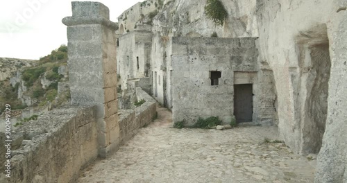 Sassi of Matera with arched ceilings and vaults. Doors and windows in an ancient underground house dug out of the tufa rock.