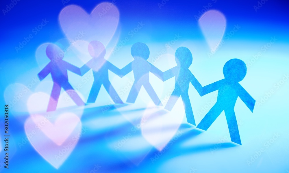 Care concept parenthood center woman help children with the glare of the sun in the form of hearts Care concept parenthood center woman help children with the glare of the sun in the form of hearts