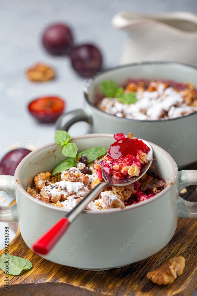 Delicious crumble of red cherry plum and oatmeal. Delicious crumble of red cherry plum and oatmeal.