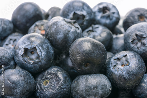 The fruits of the blueberries are stacked and appetizing.