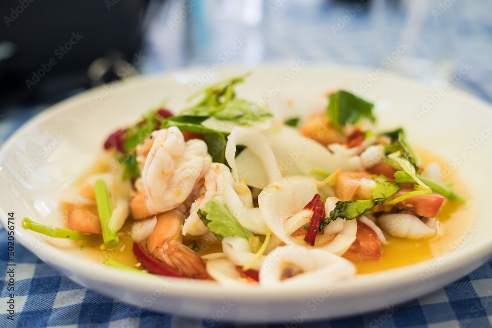 Spicy noodle salad, Thai Food. Seafood salad.