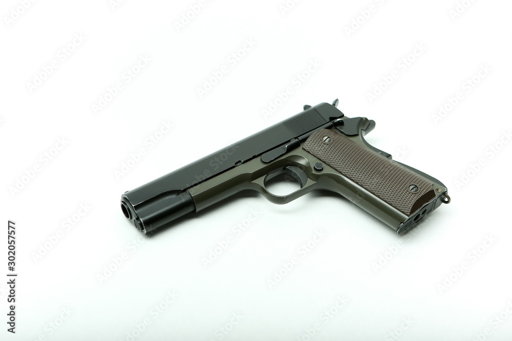 black pistol on a white background